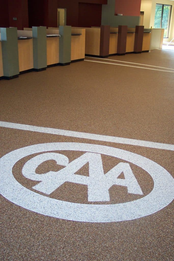 Custom BCAA logo inlaid in terrazzo flooring