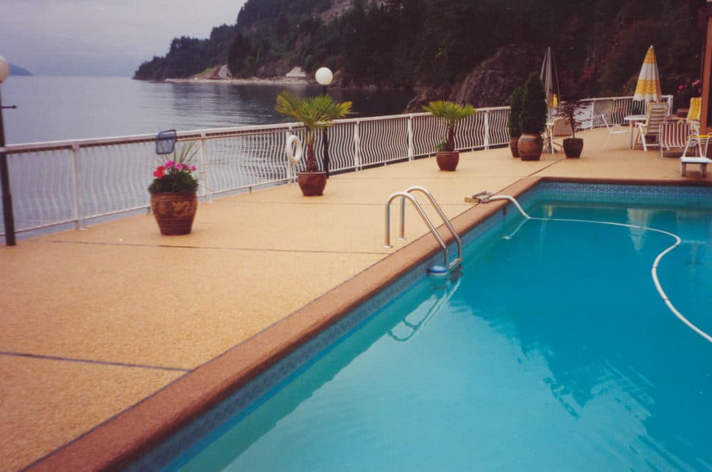 Rustic terrazzo pool deck flooring installation